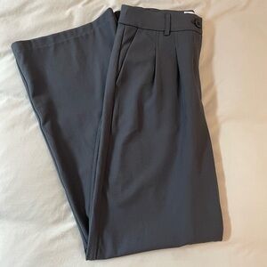 Grey high-waisted pleated trousers